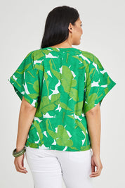 Model Terri-Leigh wearing size 14 of the Emma Top in colour Jungle (Green), from the back