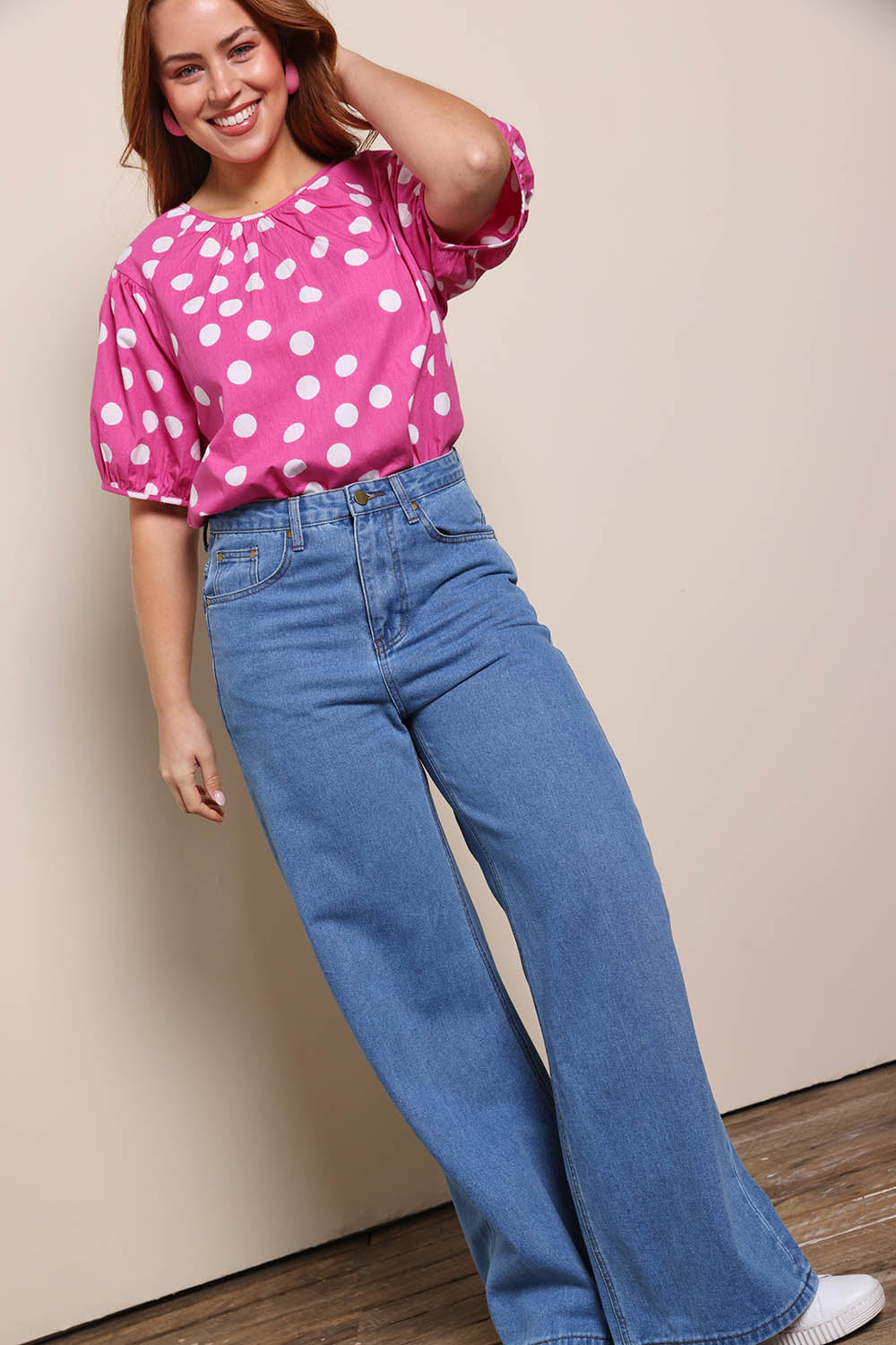 Model Georgiel wearing size 10 of the Rachel Cotton Top – Pinkspot in colour Pinkspot, from the front