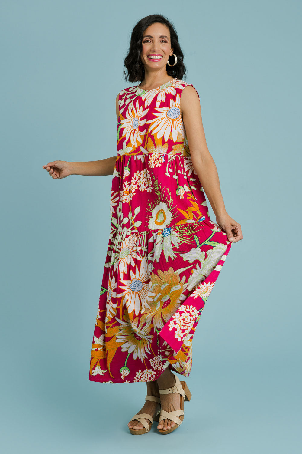 Model Natalie wearing size 10 of the Monica Maxi Dress in colour Garden (Pink), from the front, showing the whole outfit