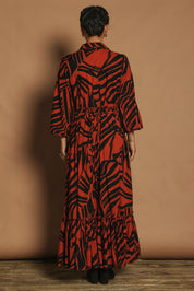 Model Katie wearing size 10 of the Nikki Cotton Maxi Dress in colour Tigerleaf, from the back