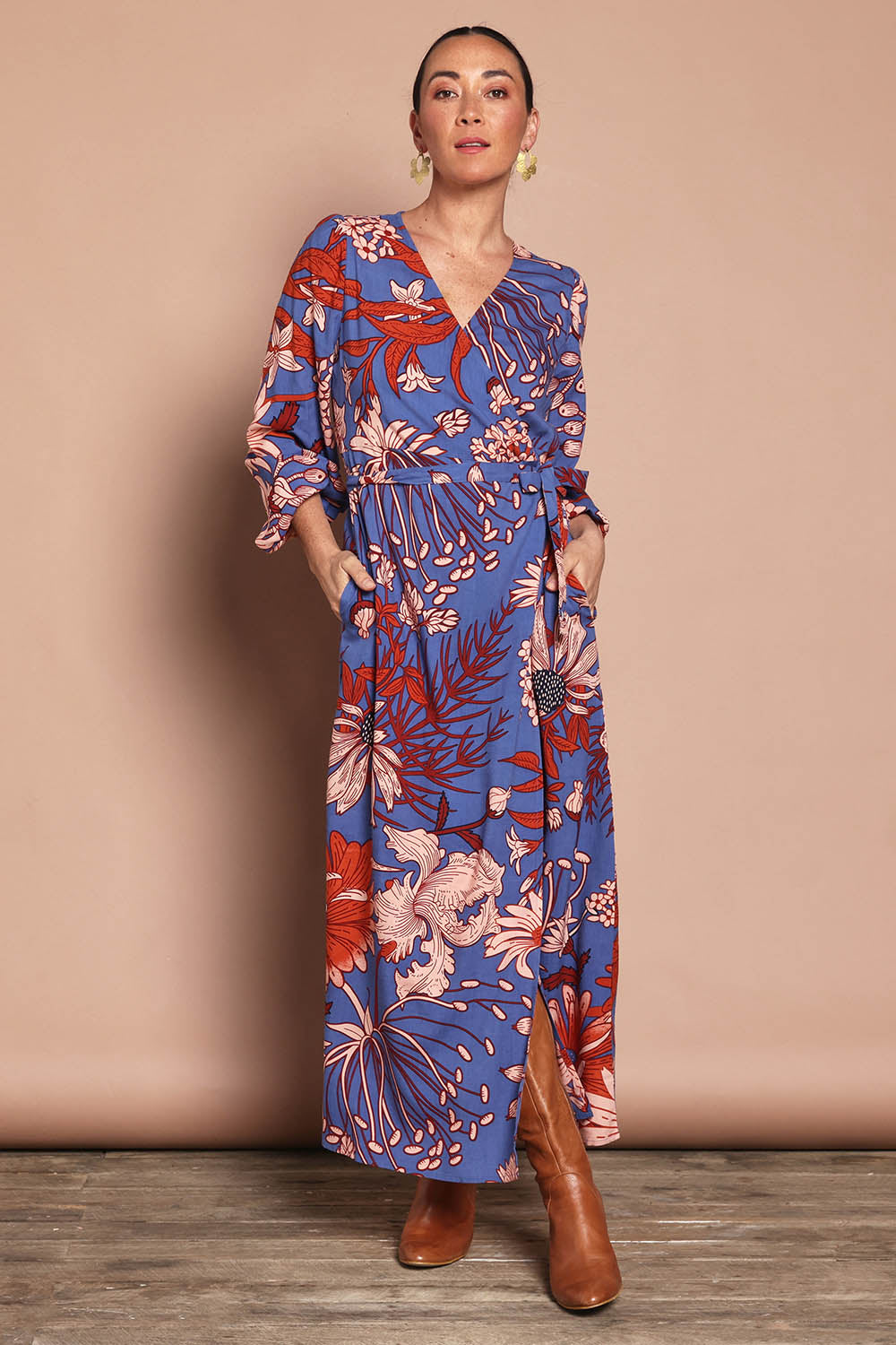Model Katie wearing size 10 of the Daphne Maxi Wrap Dress in colour Gardenblue (Blue), from the front, showing the whole outfit