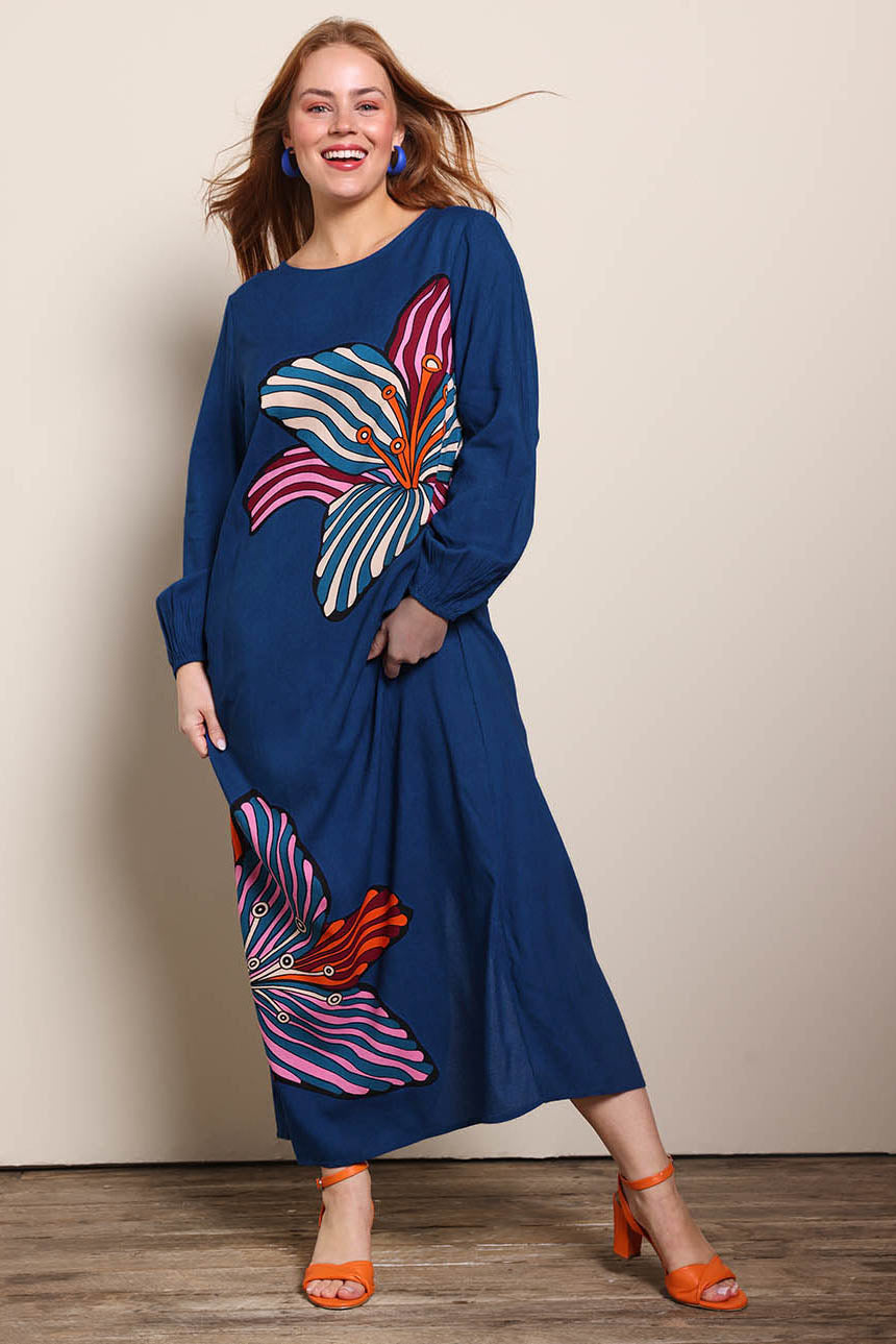 Model Georgiel wearing size 10 of the Zara Shift Dress - Blueflower in colour Blueflower, from the front