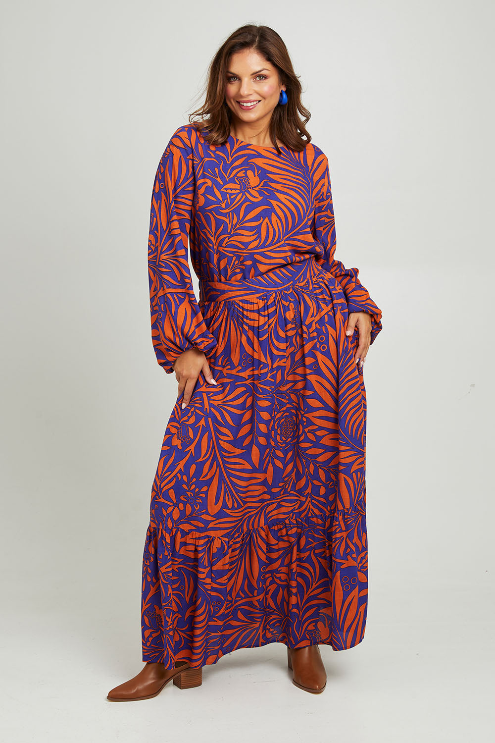 Model Monique wearing size 14 of the Harper Skirt in colour Gardenmaze (Blue), from the front, showing the whole outfit
