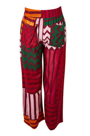 Product shot of the Andie Pant in colour Lines (Pink), from the back