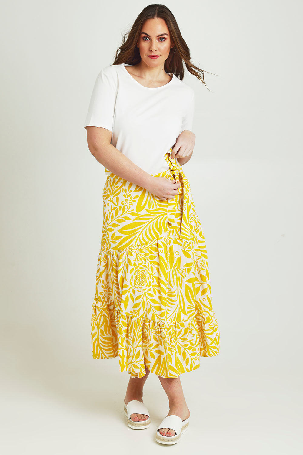 Model Jane wearing size 14 of the Isabell Cotton Wrap Skirt in colour Gardenmaze, from the front, showing the whole outfit