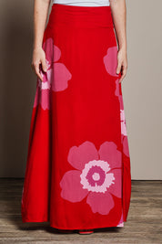 Model Katie wearing size 10 of the Rosie Maxi Skirt in colour Boldred (Red), from the front, cropped image