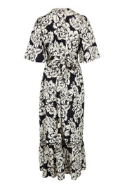 Product shot of the Anastasia Cotton Wrap Dress in colour Blooming (Black), from the back