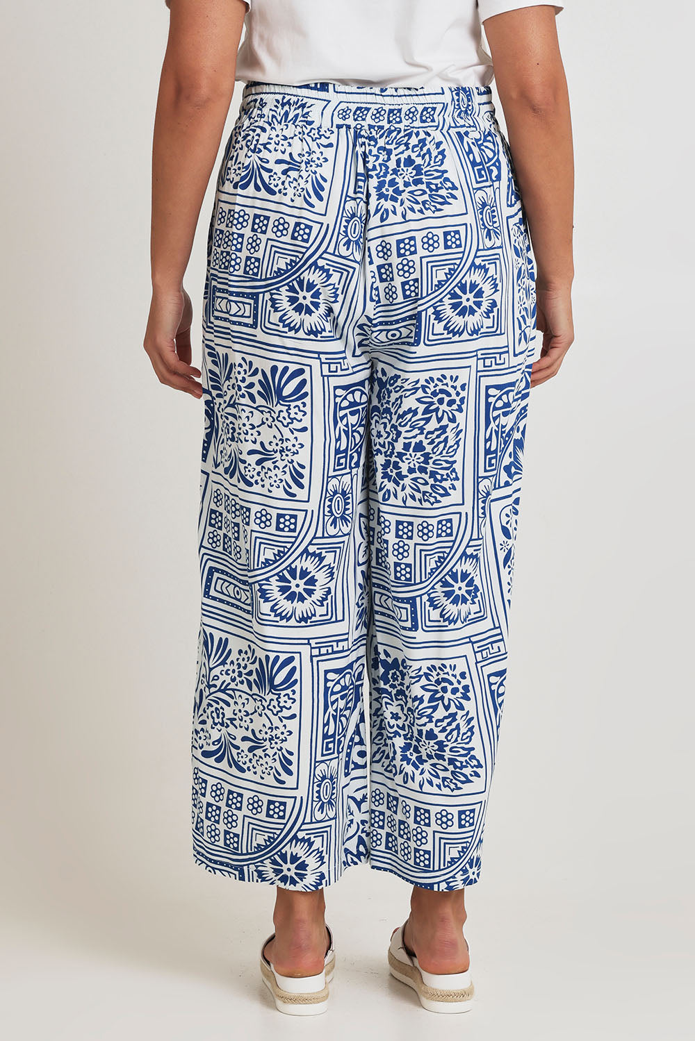 Model Terri-Leigh wearing size 14 of the Katherine Pant in colour Labyrinth (Blue), from the back