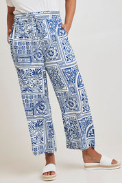 Model Terri-Leigh wearing size 14 of the Katherine Pant in colour Labyrinth (Blue), from the front, cropped image