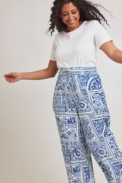 Model Terri-Leigh wearing size 14 of the Katherine Pant in colour Labyrinth (Blue), from the front, cropped image