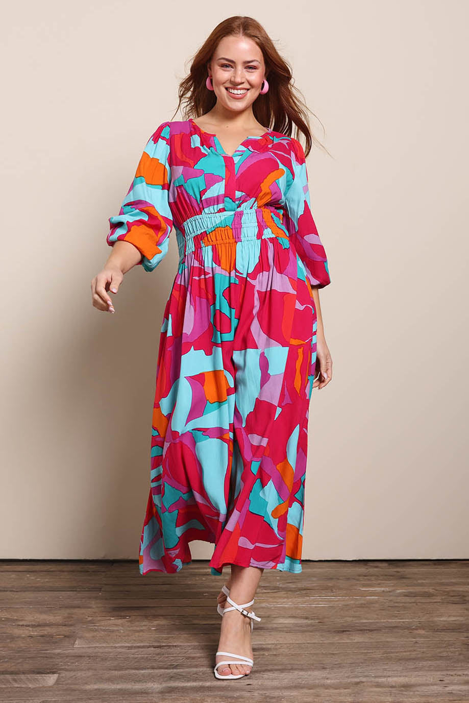 Model Georgiel wearing size 10 of the Gwyn Midi Dress – Marble in colour Marble, from the front