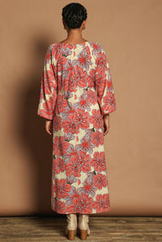 Model Katie wearing size 10 of the Aimee Aline Cotton Dress in colour Rosettes, from the back