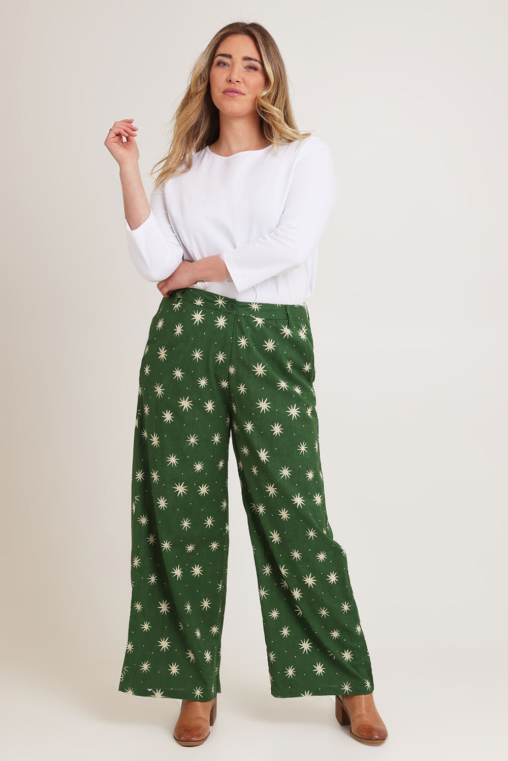 Model Chanel wearing size 16 of the Patricia Cotton Pant in colour Nightsky (Green), from the front, showing the whole outfit