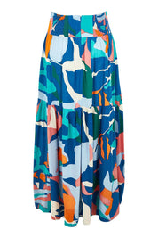 Product shot of the Ella Tiered Skirt in colour Marble (Blue), from the back