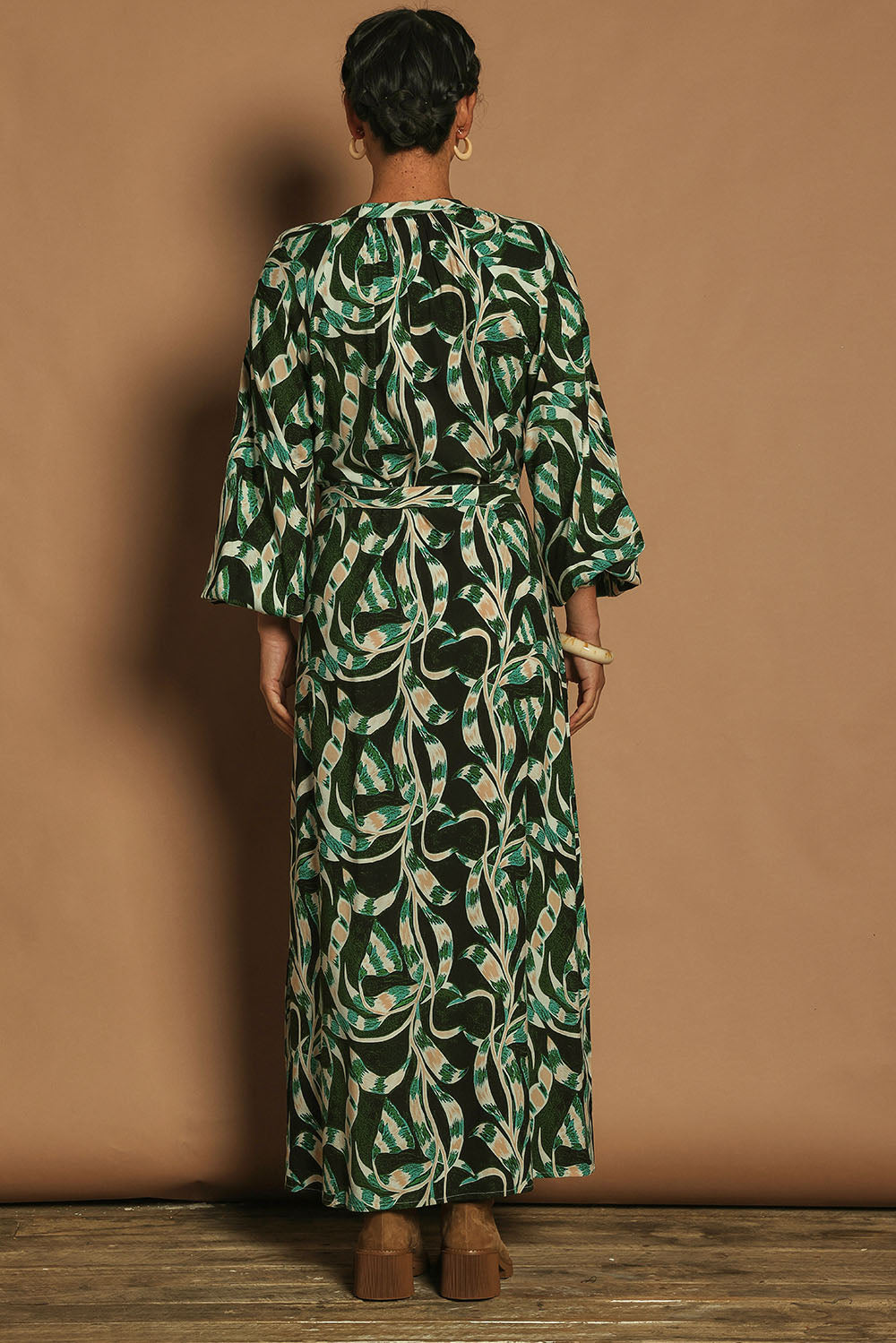Model Katie wearing size 10 of the Taylor Button Up Dress in colour Twistvine (Green), from the back