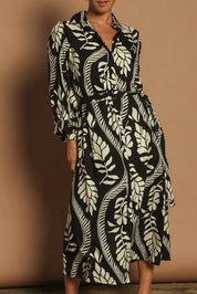 Model Katie wearing size 10 of the Leah Midi Shirt Dress in colour Blkvine (Black), from the front, cropped image