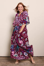Model Georgiel wearing size 10 of the Katherine Cotton Tired Dress – Garden in colour Garden, from the front
