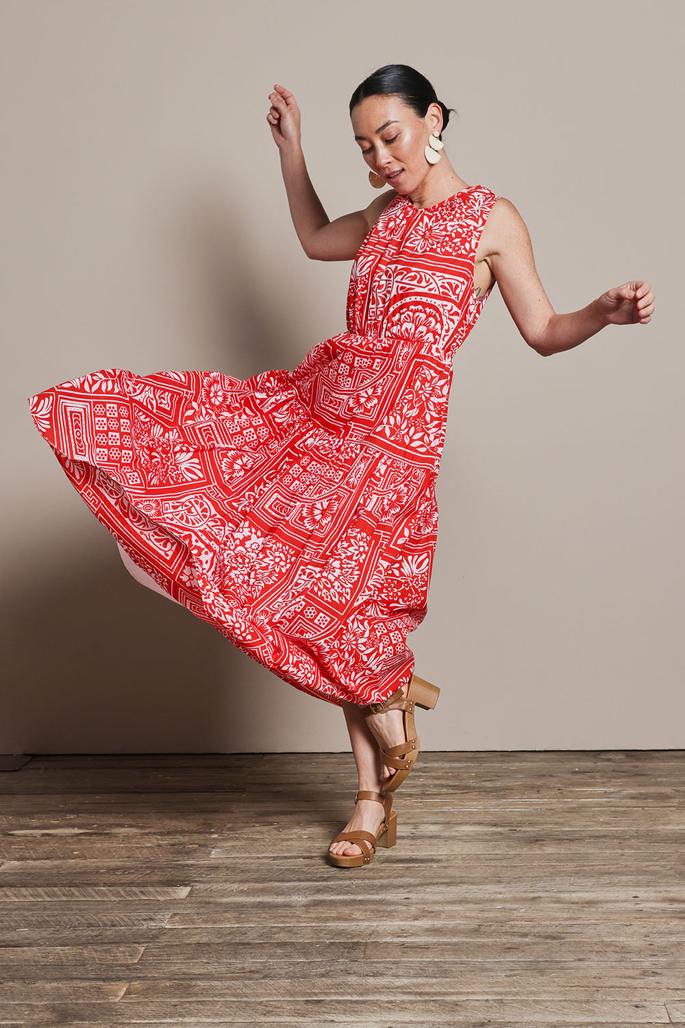 Model Katie wearing size 10 of the Riley Cotton Maxi Dress in colour Labyrinth (Red), from the front, showing the whole outfit