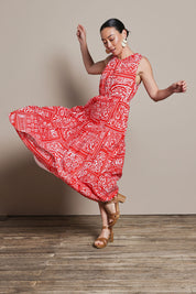 Model Katie wearing size 10 of the Riley Cotton Maxi Dress in colour Labyrinth (Red), from the front, showing the whole outfit