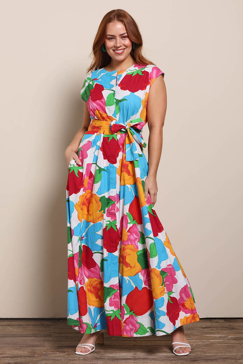 Model Georgiel wearing size 10 of the Jenny Cotton Maxi Dress – Botanix in colour Botanix, from the front