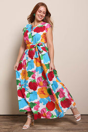 Model Georgiel wearing size 10 of the Jenny Cotton Maxi Dress – Botanix in colour Botanix, from the front