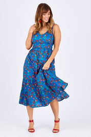 Model Laura wearing size 12 of the Scarlet Summer Dress Kaleidoscope in colour Blue (Blue), from the front, showing the whole outfit