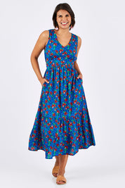 Model Thais wearing size 10 of the Scarlet Summer Dress Kaleidoscope in colour Blue (Blue), from the front, showing the whole outfit