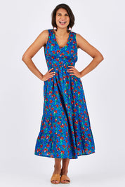 Model Thais wearing size 10 of the Scarlet Summer Dress Kaleidoscope in colour Blue (Blue), from the front, showing the whole outfit