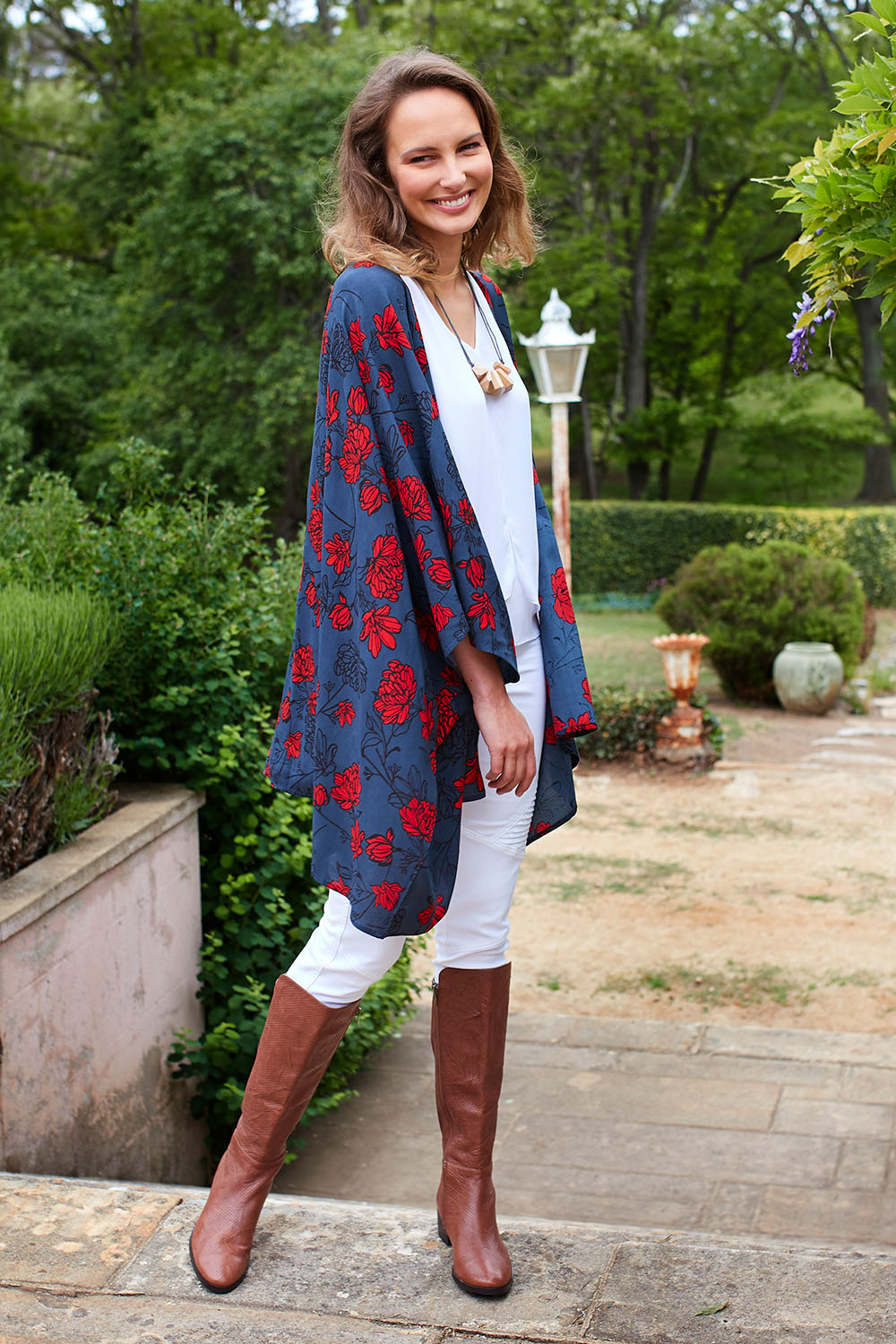 Model Alex wearing size 10 of the Viola Kimono Radiant Floral in colour Grey (Grey), from the front, showing the whole outfit