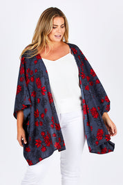 Model Fiona wearing size 16 of the Viola Kimono Radiant Floral in colour Grey (Grey), from the front, cropped image