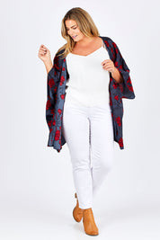 Model Fiona wearing size 16 of the Viola Kimono Radiant Floral in colour Grey (Grey), from the front, showing the whole outfit