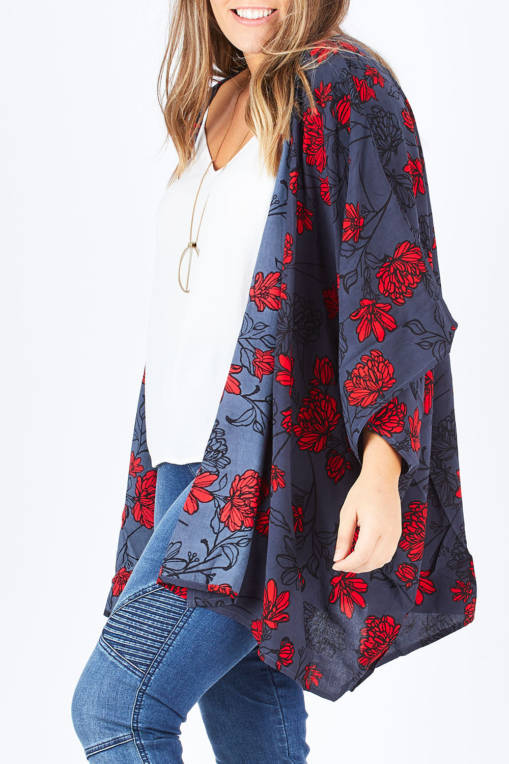 Model Natalia wearing size 14 of the Viola Kimono Radiant Floral in colour Grey (Grey), from the front, cropped image