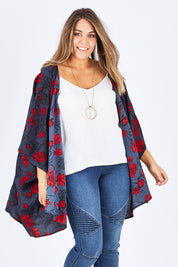 Model Natalia wearing size 14 of the Viola Kimono Radiant Floral in colour Grey (Grey), from the front, cropped image