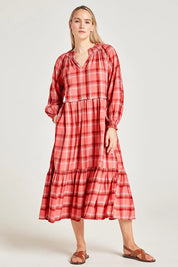A model wearing the Iman Hemp Check Midi Dress in colour Lightcoral (Pink), from the front, showing the whole outfit