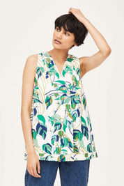 A model wearing the London Fields Pleat Front Top in colour Vanillacre (White), from the front, cropped image