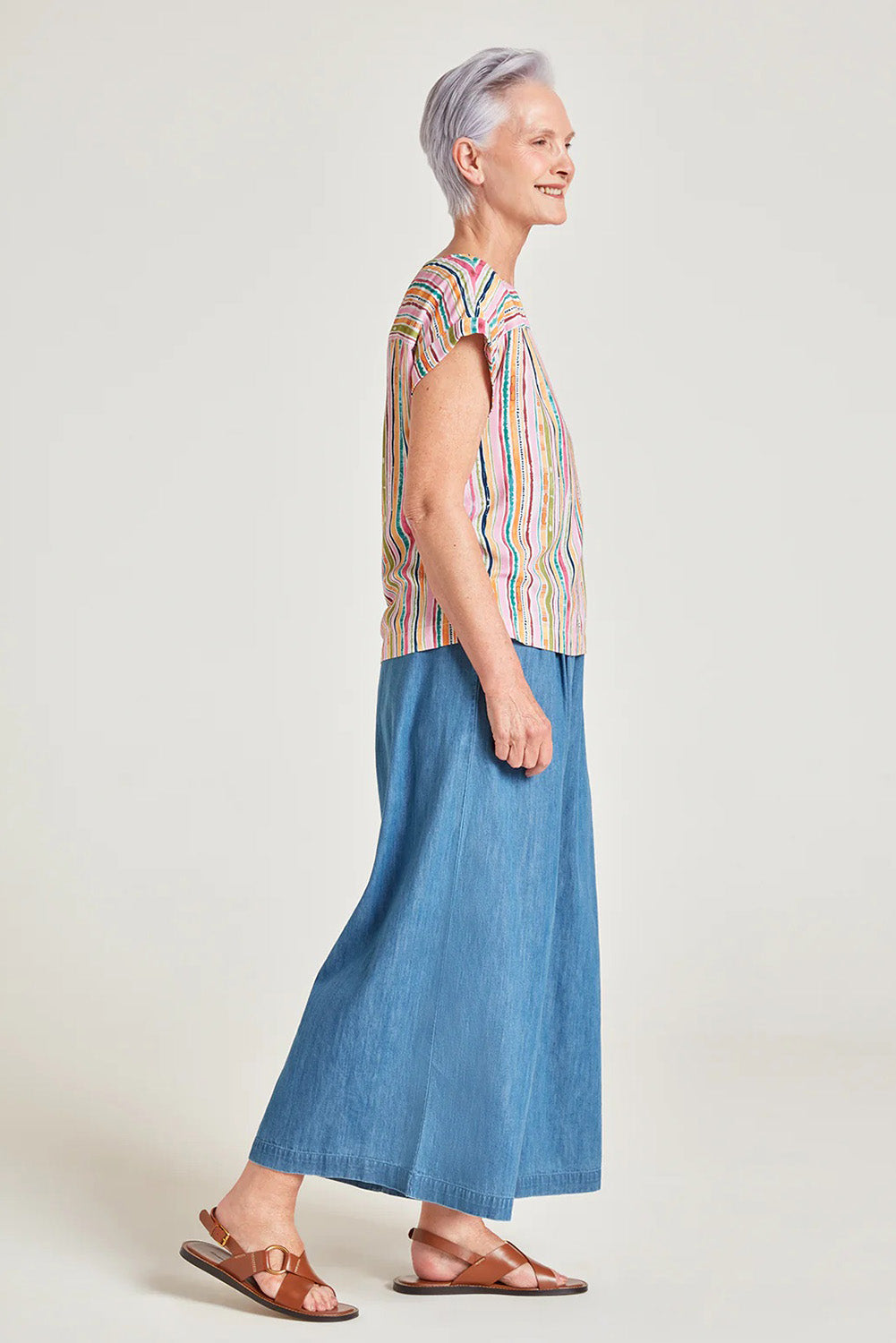 A model wearing the Melinoe Lenzing Ecovero Top in colour Multi (Pink), from the front, showing the whole outfit