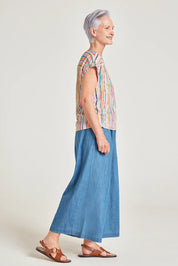 A model wearing the Melinoe Lenzing Ecovero Top in colour Multi (Pink), from the front, showing the whole outfit