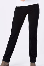 Model Marnee wearing size S of The Slimming Trouser Leg Pant in colour Black (Black), from the front, cropped image