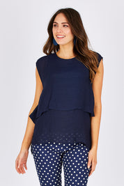 Model Madeline wearing size S of the Layered Top in colour Navy (Blue), from the front, cropped image