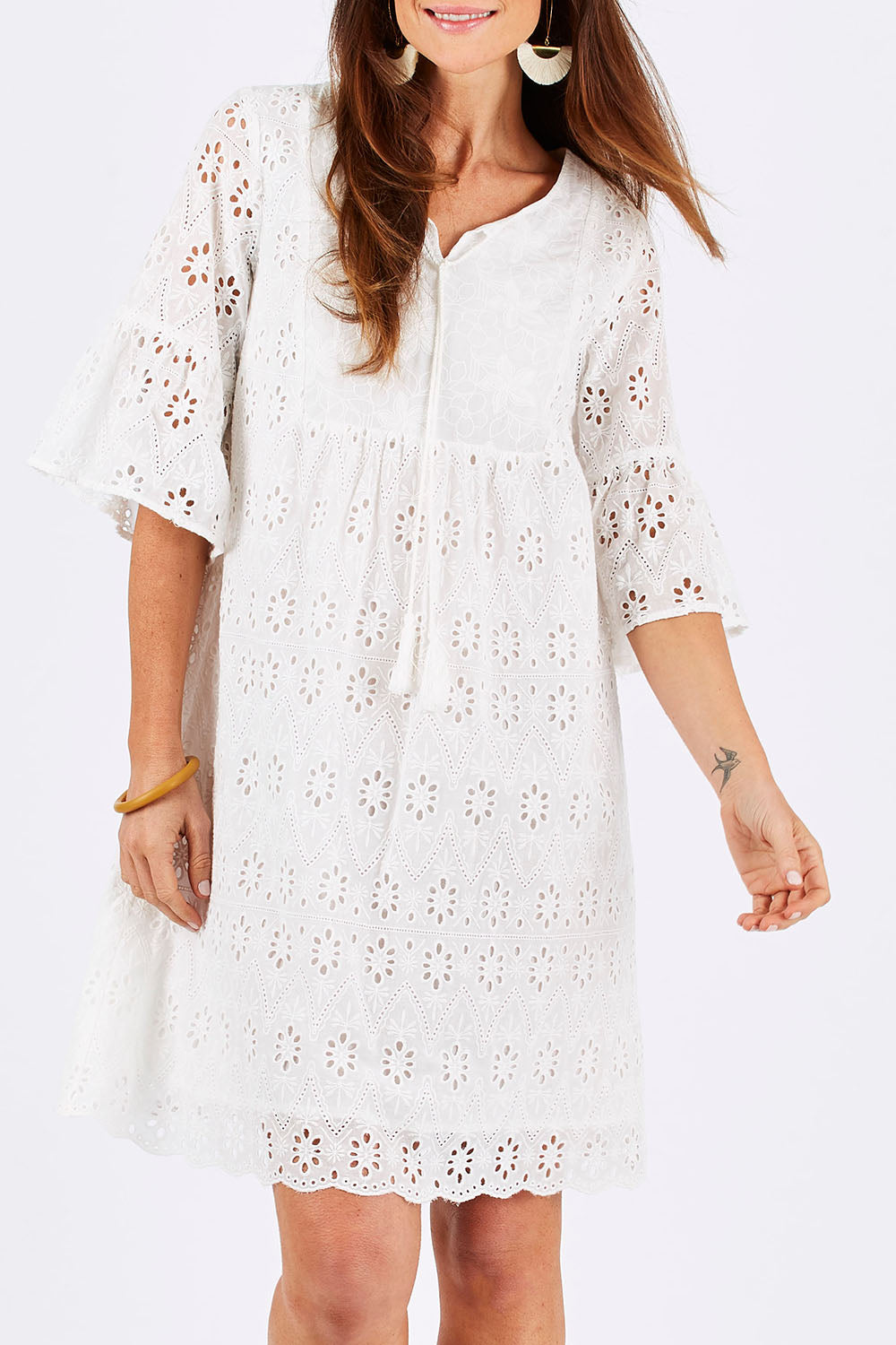 Model Monique wearing size S of the Lace Dress in colour White (White), from the front, cropped image