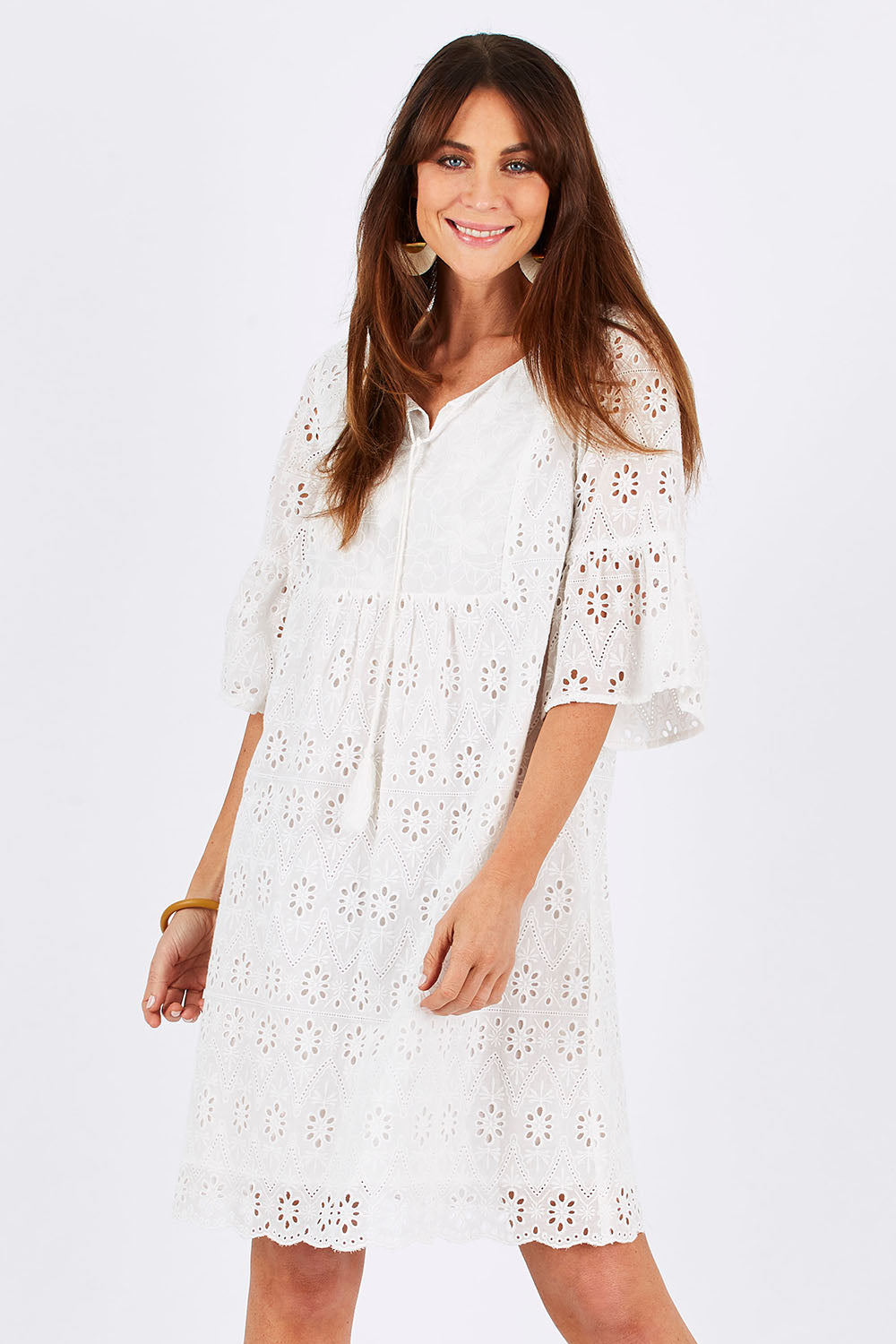 Model Monique wearing size S of the Lace Dress in colour White (White), from the front, cropped image