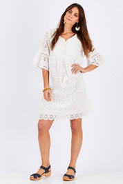 Model Monique wearing size S of the Lace Dress in colour White (White), from the front, showing the whole outfit