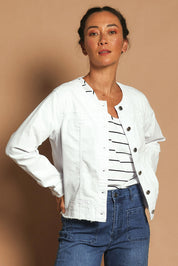 Model Katie wearing size S of the Collarless Jacket in colour White (White), from the front, showing the whole outfit