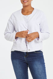 Model Noli wearing size L of the Collarless Jacket in colour White (White), from the front, cropped image