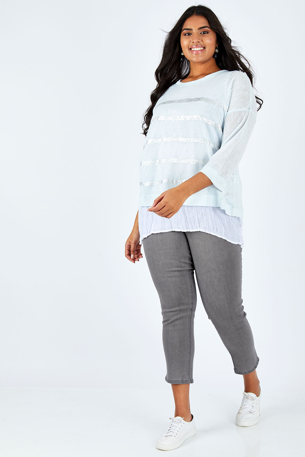 Model Shanaya wearing size L of the Foil Striped 2 In 1 Top in colour Blue (Blue), from the front, showing the whole outfit
