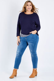 Model Fiona wearing size XL of the Pull On Ripped Jeans in colour Denim (Blue), from the front, showing the whole outfit