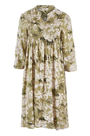 Product shot of the Exclusive Printed Flute Sleeve Dress in colour Garden (Green), from the front