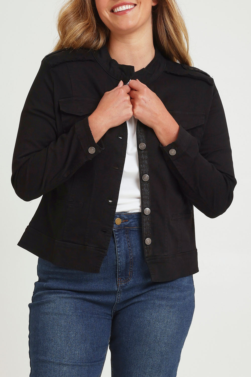Model Chanel wearing size XL of the Military Denim Jacket in colour Black (Black), from the front, cropped image