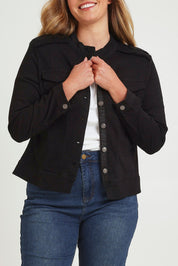 Model Chanel wearing size XL of the Military Denim Jacket in colour Black (Black), from the front, cropped image