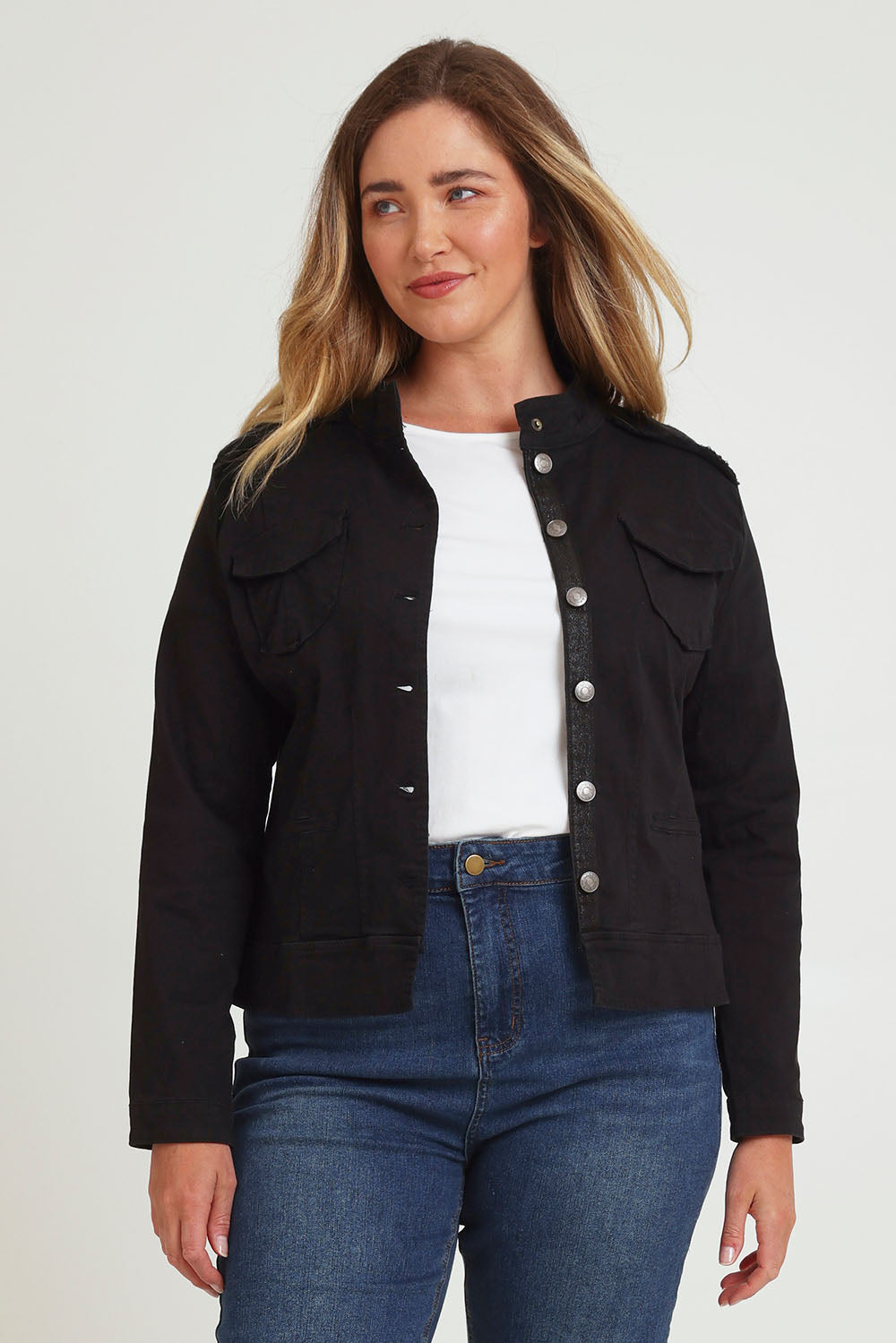 Model Chanel wearing size XL of the Military Denim Jacket in colour Black (Black), from the front, cropped image